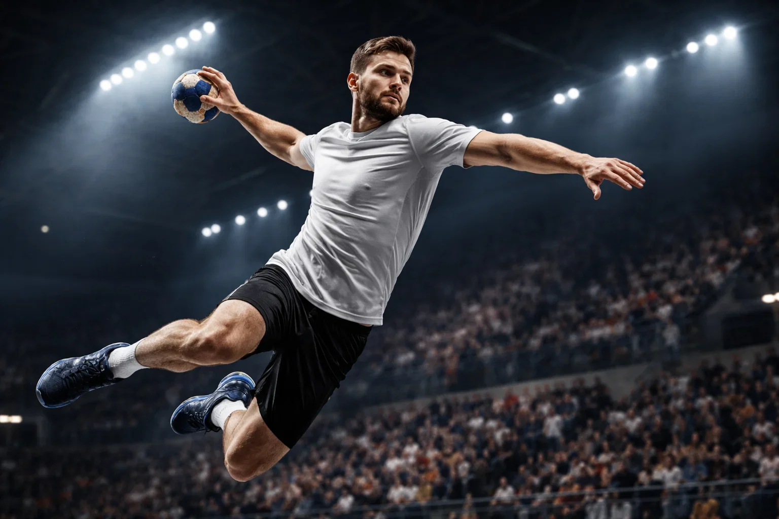 Handballspieler wirft den Ball während eines Bundesliga-Spiels